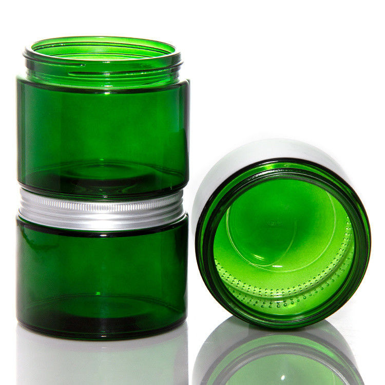 Leere grüne klare Glaskerzen mit Deckel