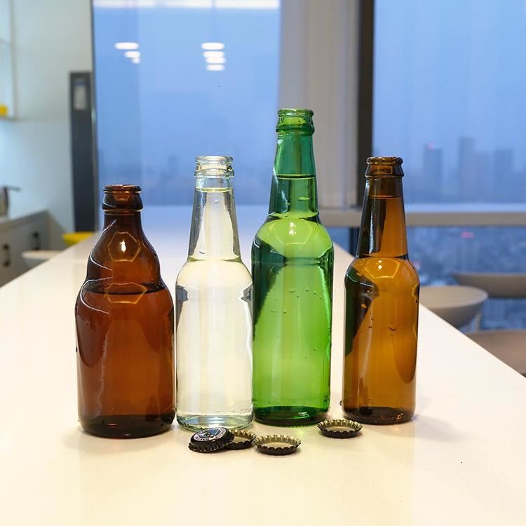 Hochwertiges Grünes Bernsteinbier Glasflasche Klares Warmstempelgetränk für Bier