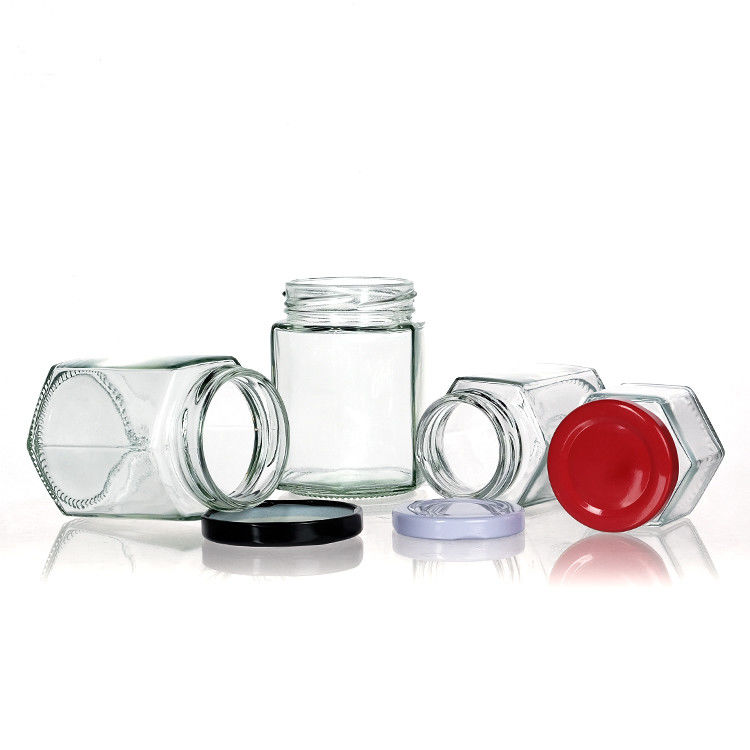 Durchsichtige Flaschenflaschen mit Deckel Hexagon Glaslagerflasche für Teekanister