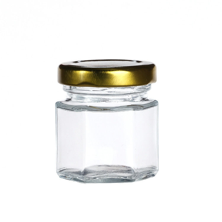 Durchsichtige Flaschenflaschen mit Deckel Hexagon Glaslagerflasche für Teekanister