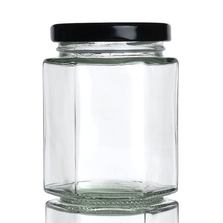 Durchsichtige Flaschenflaschen mit Deckel Hexagon Glaslagerflasche für Teekanister